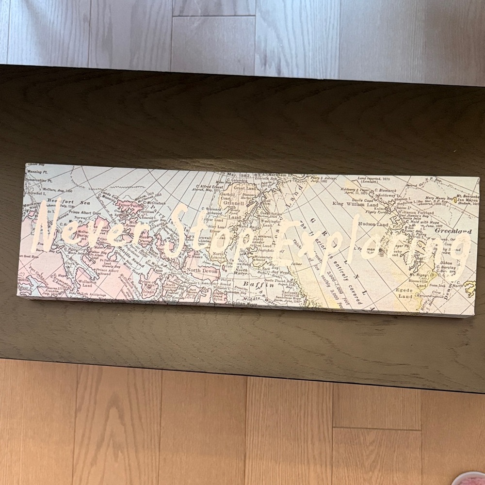 Map Wall Art with 'Never Stop Exploring' Text